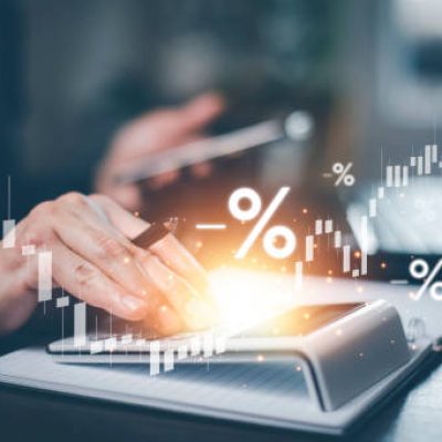 Concept of tax payment optimisation business finance,Man using calculator and taxes icon on technology screen,income tax and property, background for business, individuals and corporations such as VAT